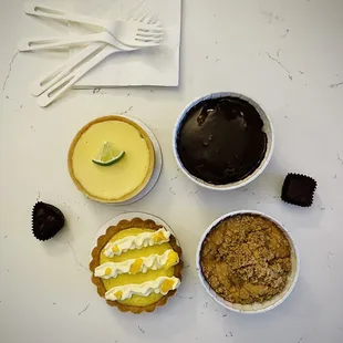 Starting from Bottom Right Corner: Pear Buttermilk Cake, Lemon Mango Tart, Key Lime Tart, Triple Chocolate Cake