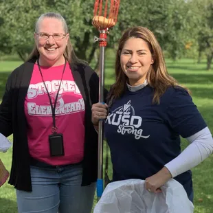 My co-worker and myself happily eager and ready to pick our first apples!