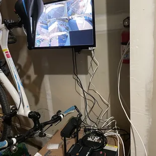 Security camera dvr setup in garage! Placed on a moving box.