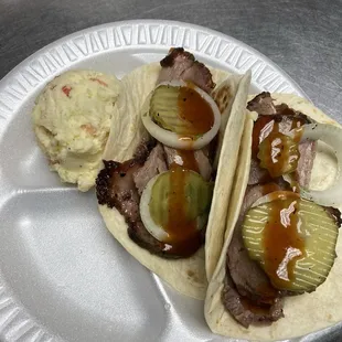Great brisket tacos only $4 each! Plus homemade potato salad! Yummy!