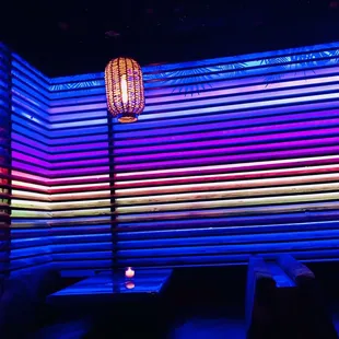 Inside across from the last booth on your right