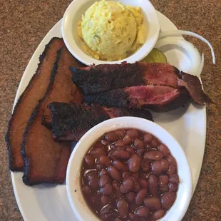 2 meat combo with beef ribs, sliced brisket, potato salad and baked beans.