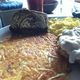 2 eggs with chicken fried steak and the hashbrowns, Hashbrowns are super thin, super crispy, super tasty. touch of garlic powder
