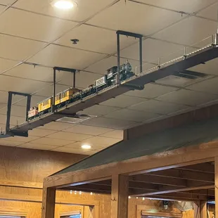 They have an actual working overhead train moving on its track above you