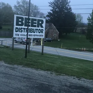 a sign on the side of the road