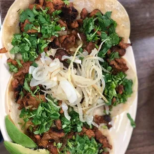 a taco with meat and vegetables