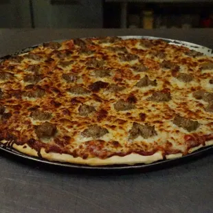 Nice and crispy cheese and sausage pizza