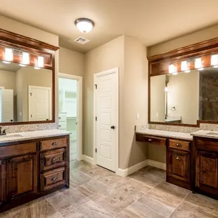 a large bathroom with double sinks