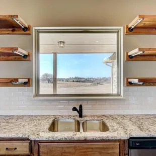 a kitchen with granite countertops