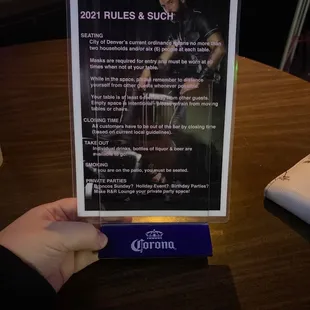 a person holding a sign