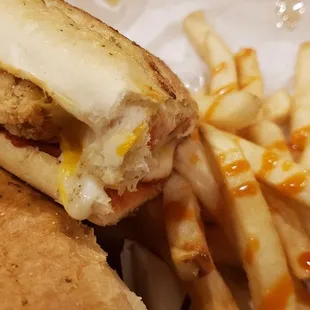 Chicken parmesan sandwich with Buffalo fries.