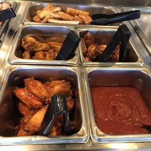 Hot, Honey Mustard, and Teriyaki wings on our buffet. Also our cheese squares and marinara sauce for dipping.
