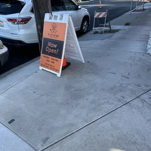 Restaurant sign out front.
