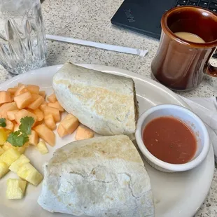 Breakfast burrito, fruit and coffee