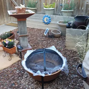 a fire pit in a backyard