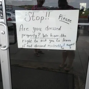 a sign in a store window