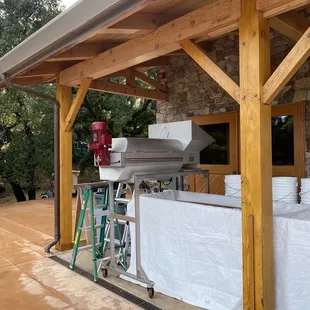 a covered outdoor kitchen