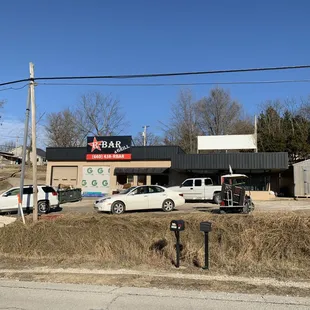 a parking lot with parked cars