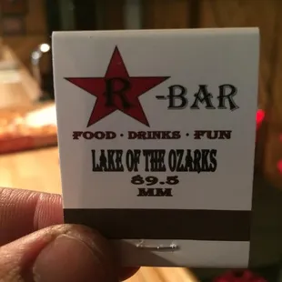 a person holding up a sign