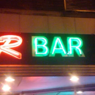 a neon sign for a bar