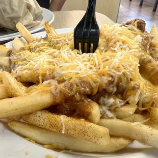 Chili cheese fries. $7.99 regurarly and $4 happy hour 2-5pm.