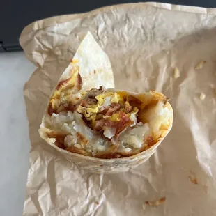 Bacon Breakfast burrito. Had way too many potatoes.
