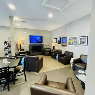 a living room with a flat screen tv