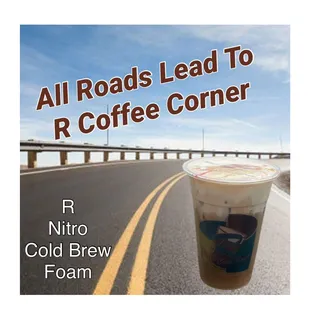 a cup of coffee on the side of the road