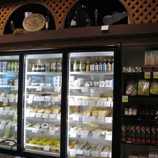 a display of wine and cheese