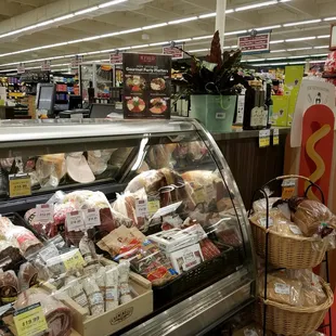 a display of meat and cheeses