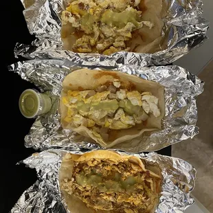 From bottom to top: Egg and Chorizo Taco, Egg and Potato Taco, Egg and Bacon Taco