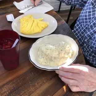 Biscuits and gravy with scrambled eggs