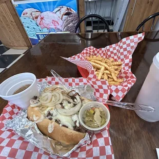 Italian sandwich with hot peppers, onions, and a side of Au Jus. Hot fries.