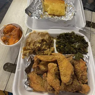 Lemon fried wings, dressing, collard greens, and yams with a side of cornbread!