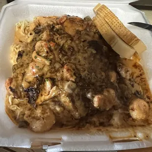 Blackened ribeye with crawfish topping.