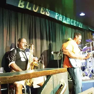 a group of men playing instruments