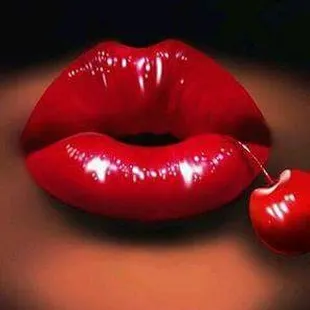 a red lip and a cherry