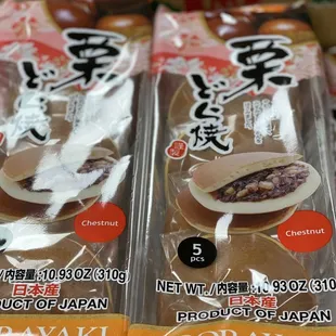 three packages of japanese food