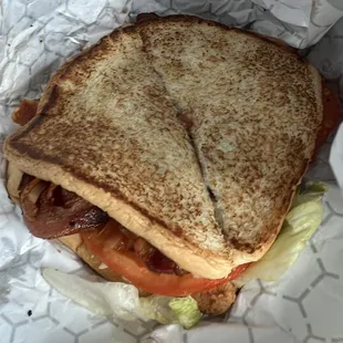 BLT with crispy bacon and fresh ripe tomatoes