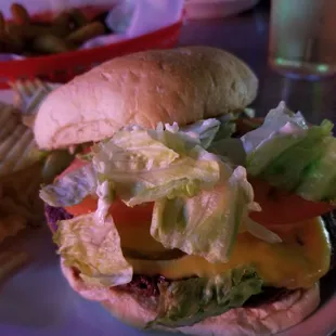 Burger with a side of chips, an order of the pickle fries, and a Vernor&apos;s soda to drink.