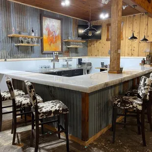 "R" Saloon mostly made from old materials found on the property.