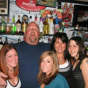 a group of people posing for a picture