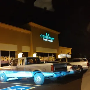  a truck parked in front of a store