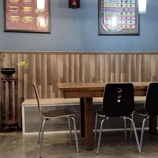 a table and chairs in a restaurant