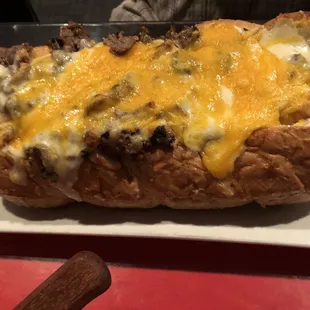 Steak and gravy with cheese