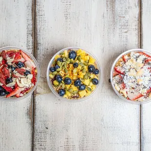 three bowls of fruit salad