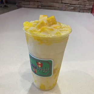Mango raspados with lechera and ice cream. THE BEST raspado I've ever had, I will only be getting my rapados from here !