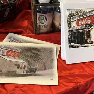 a coke can and a coke can on a table