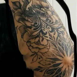 Cynthia added peonies with some leaves falling and the elbow mandala.  Not the best angle for the pic.