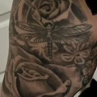 Cynthia added the huge roses and cherry blossoms. She blended them into the dragon flies that I had previously.